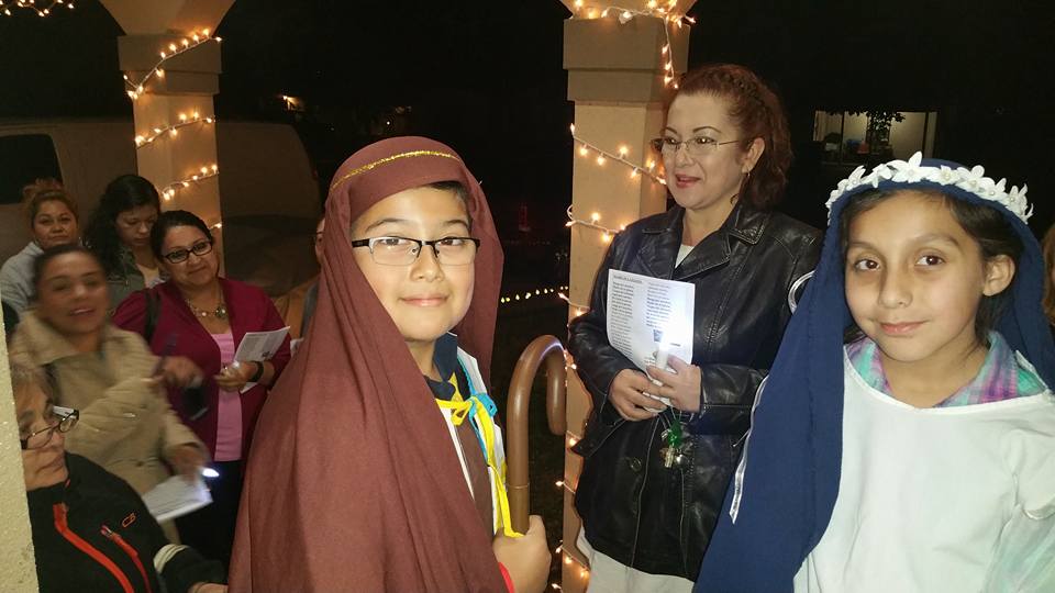 Children and adults celebrate Posadas at St. Peter’s Episcopal Church in Pasadena, TX